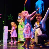 Children and adults playing or moving together