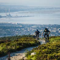 Two mountain bikers on a mountain trail