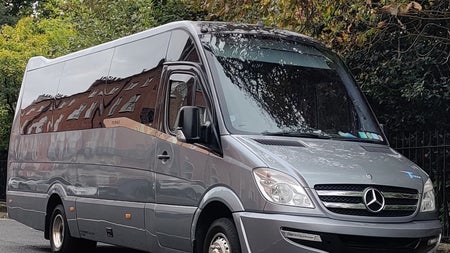 A luxury mini bus on the road