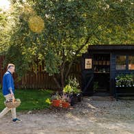 An exterior view of the honesty farm shop at Fat Tomato