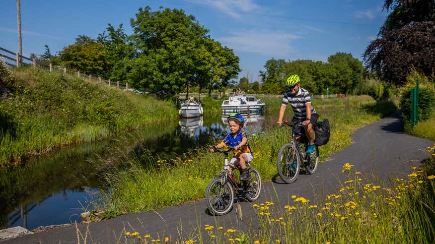Father and son cycling the Royal Canal Greenway in Co Westmeath