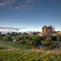 Dusk at Trim Castle in Meath surrounded by green hills
