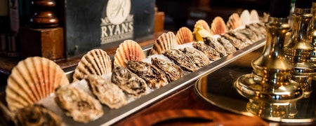 An arrangement of seashells and seafood