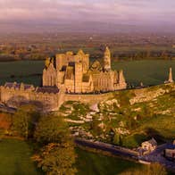 Aerial view of the Rock of Cashel at sunset