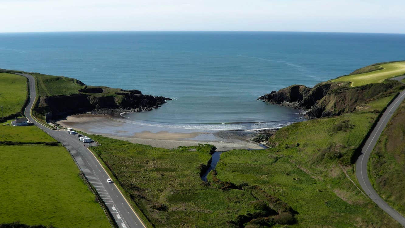 Aerial image of Kilmurrin beach, cove and headland, County Waterford