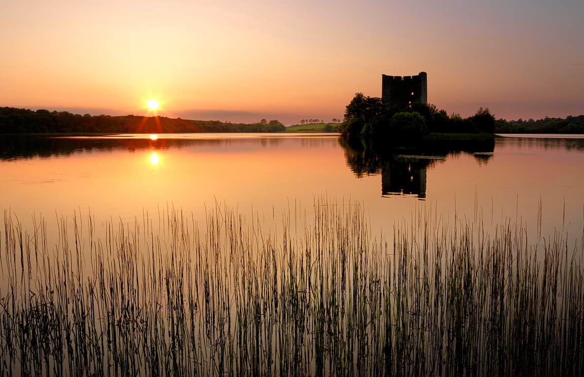 Sun setting over Cloughoughter, County Cavan