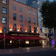 An exterior street view of Murray's Bar & Grill