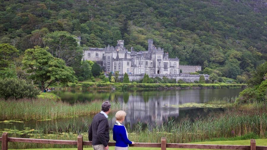 People admiring the lakeshore views at Kylemore Abbey