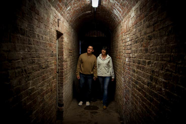 A couple touring the inside of Spike Island prison in County Cork