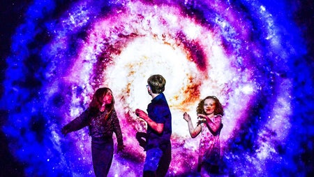 Children enjoying a light installation at EPIC