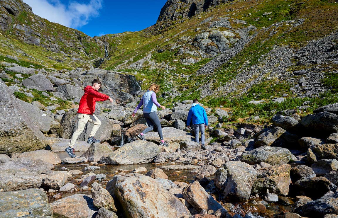 People hiking Mahon Falls in Co Waterford