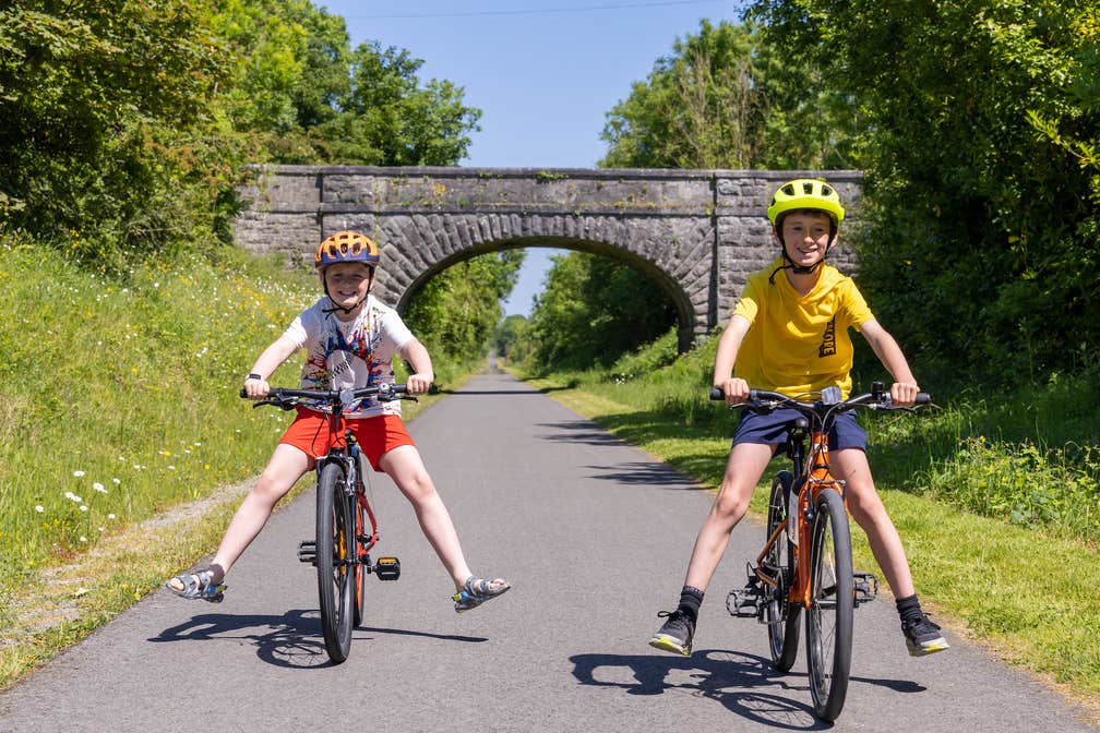 Two boys cycling the Old Rail Trail Greenway in County Westmeath