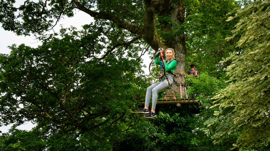 Girl using a zipline at Lough Key Forest and Activity Park