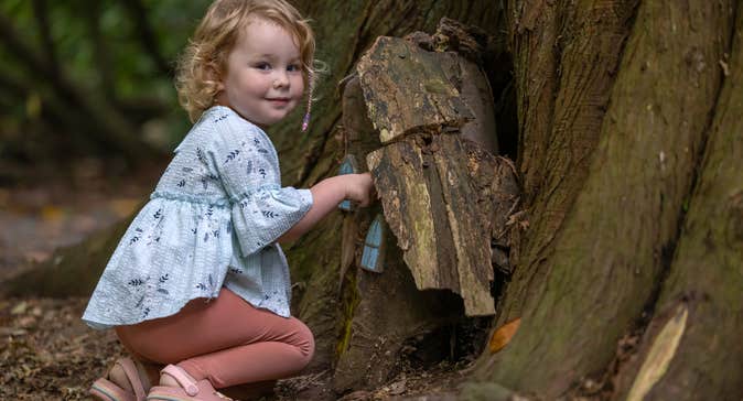 A little girl in the Fairy Garden in Belvedere House Gardens and Park in County Westmeath