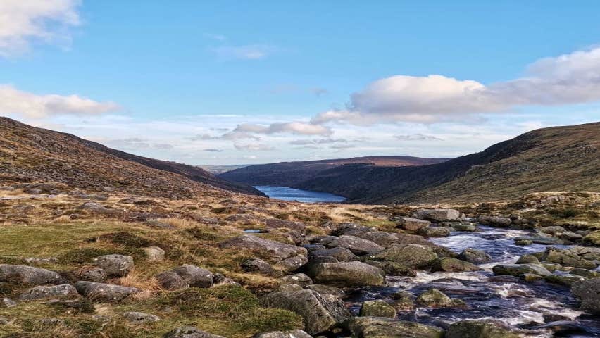 View of the water between mountains.