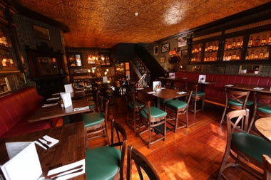 An interior view of The Oval table seating area