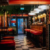 Interior bar and seating at The Chelsea Drugstore