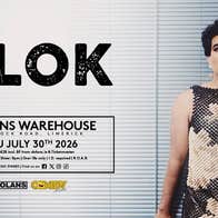 Poster for comedian Alok with person in a dress, pursing their lips.