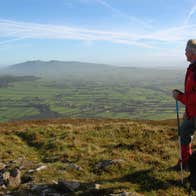 Two people in hiking gear walking Blackrock Loop, Ballyhoura, County Limerick