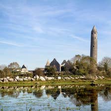 Round tower and churches at Kilmacduagh Monastic Site, County Galway