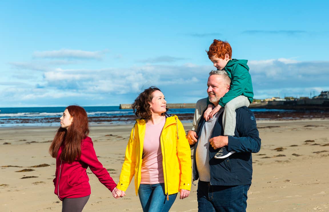 A family on Enniscrone Beach in Co Sligo