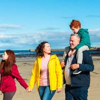 A family on Enniscrone Beach in Co Sligo