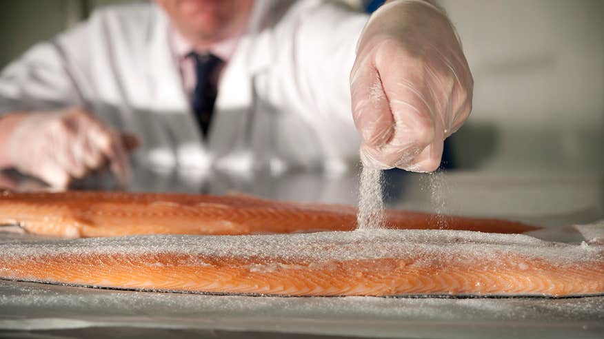 Adding the finishing touches to salmon at Frank Hederman salmon, Cork