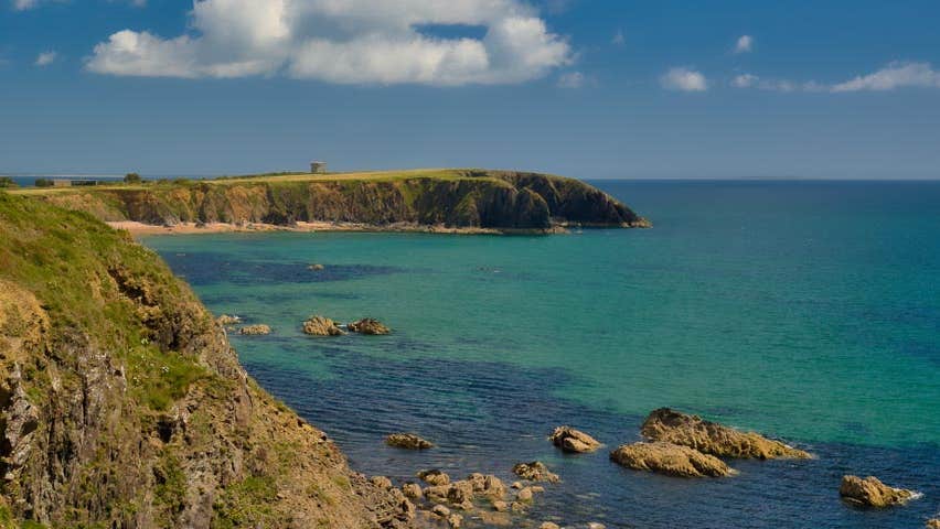 Coastal edge and blue water at Baginbun Head in Wexford