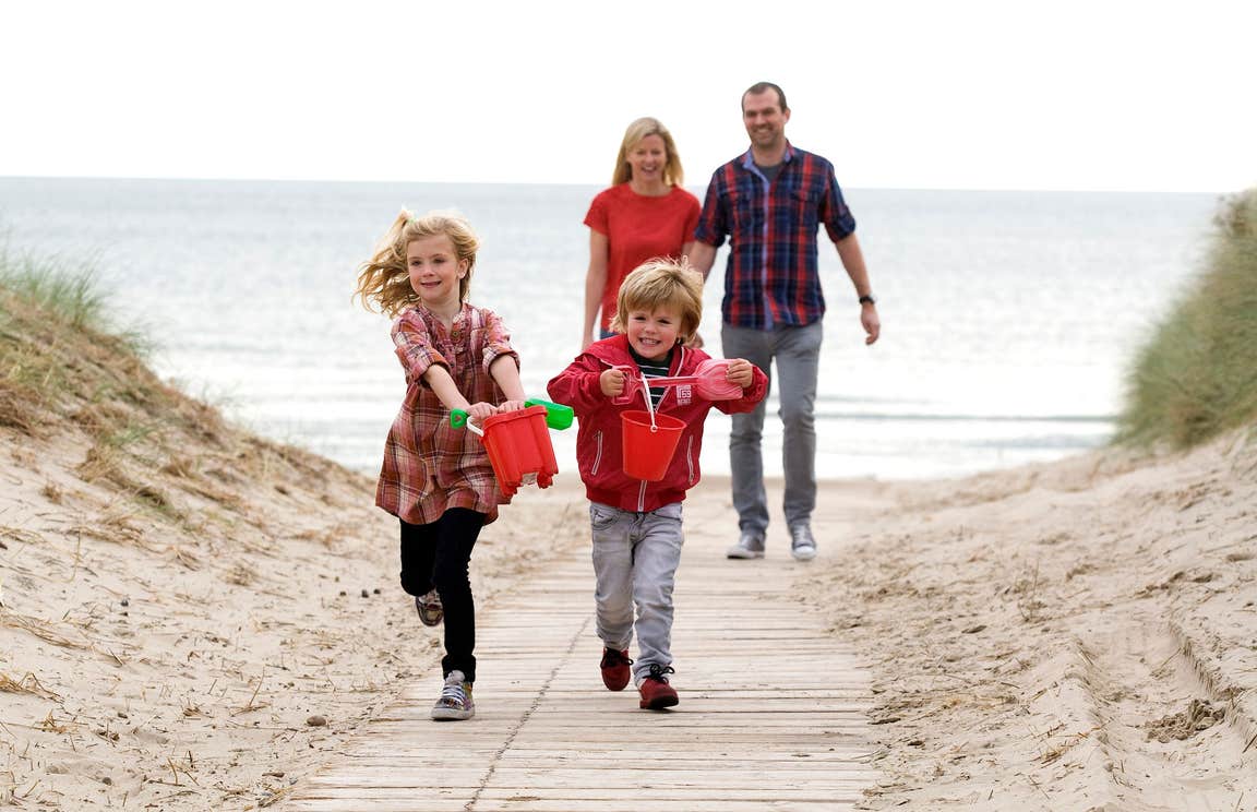 A family playing on Curracloe Beach, Wexford