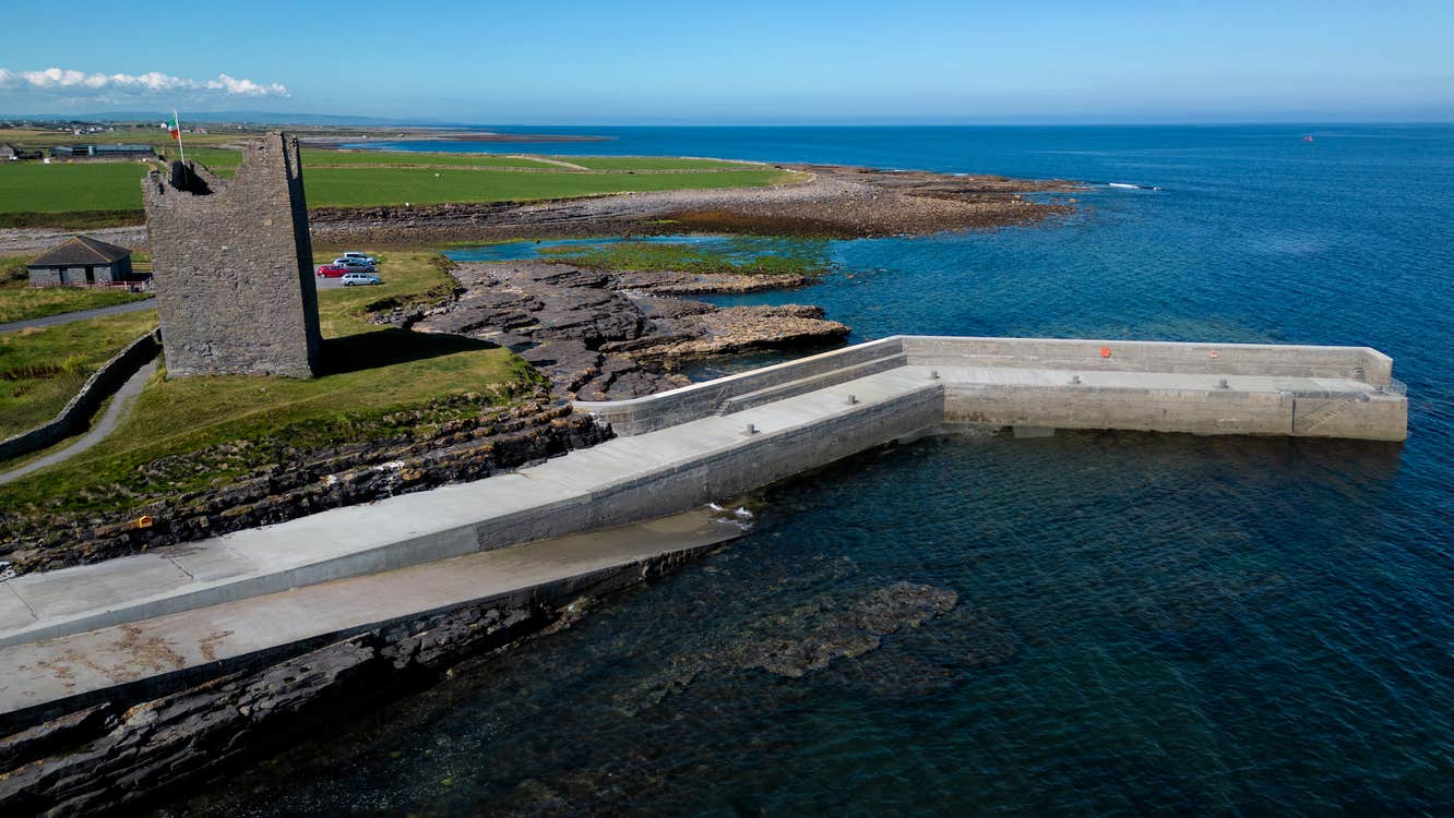 Roslee Castle and Easky Pier in Sligo on a sunny day.