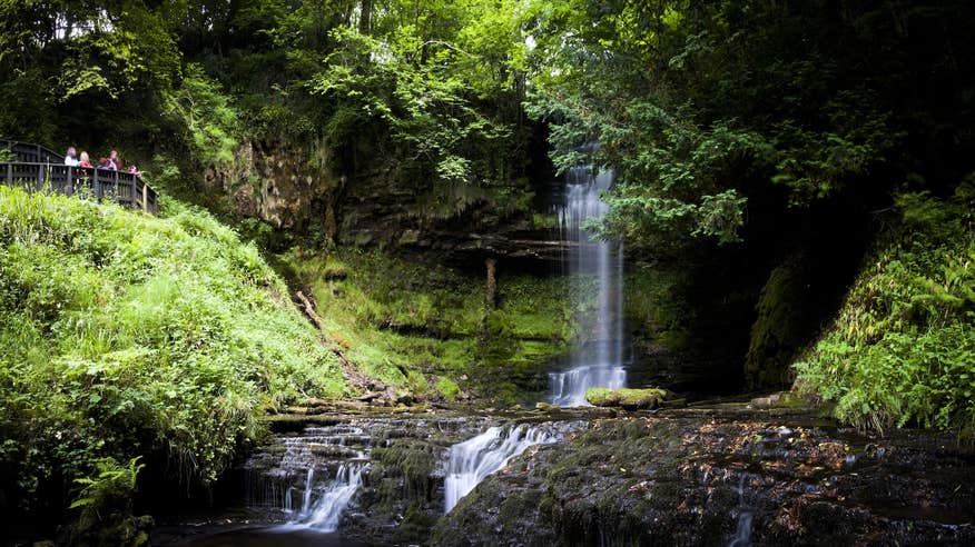 People visiting Glencar Waterfall in Co Leitrim