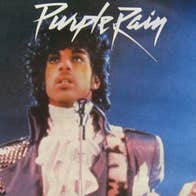 When Doves Cry: A Prince Film Night, a man on a stage playing a guitar with a worried look on his face.