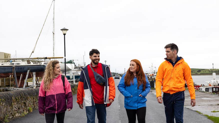 People walking along Westport Quay in Co Mayo