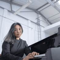 Shuteen Erdenebaatar at a piano.