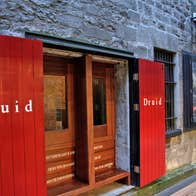 Druid Theatre entrance with red doors on Druid Lane in Galway