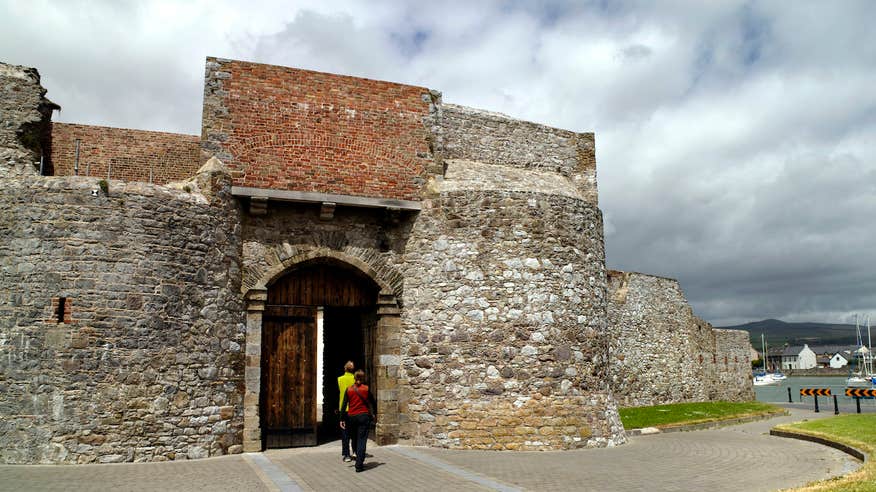 Two people visiting Dungarvan Castle in County Waterford.