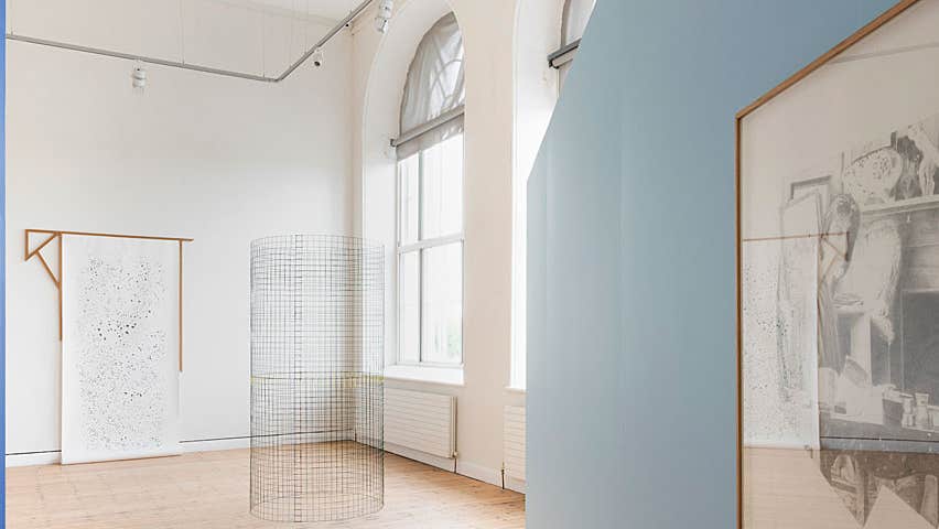 The Dock Arts Centre interior gallery area with blue walls