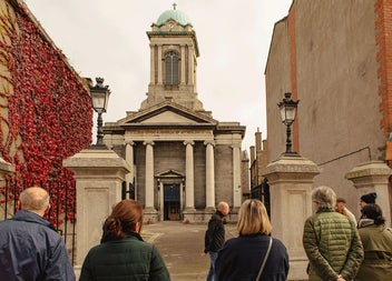 A group on a walking tour with In Our Shoes walking Tours