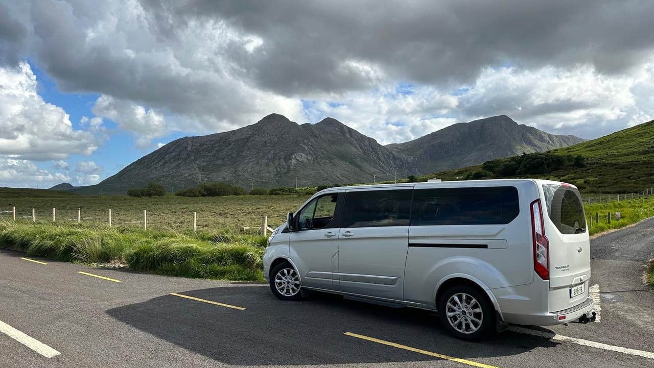Tour bus with mountain in the background