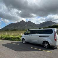 Tour bus with mountain in the background