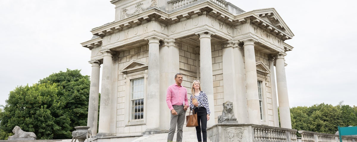 A couple standing outside a Casino Marino