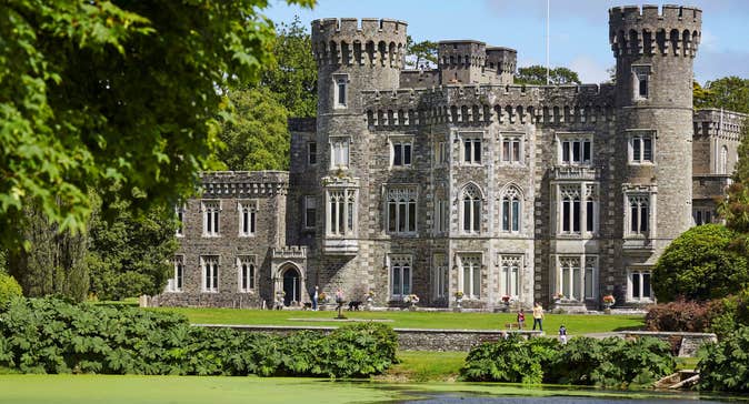 Johnstown Castle Estate exterior of the castle with the lake in front