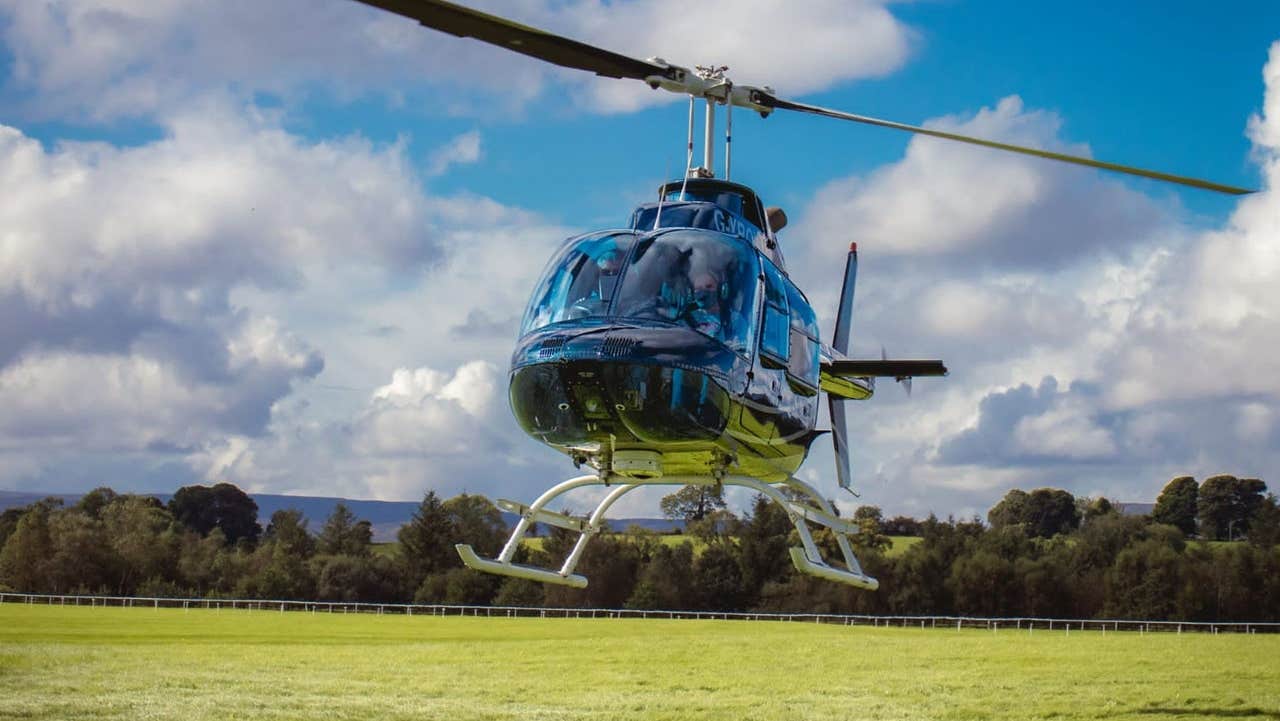 An Adventure 001 Helicopters Ireland helicopter taking off