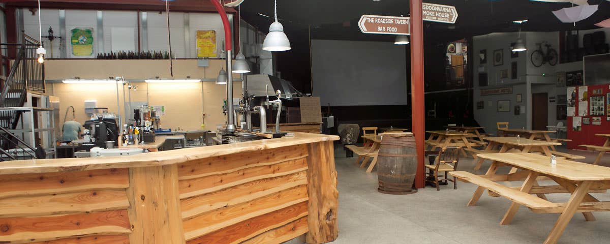 Interior view of bar with tables and benches