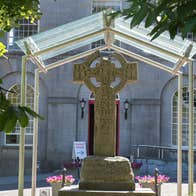 An ancient stone high cross outside Kells Courthouse