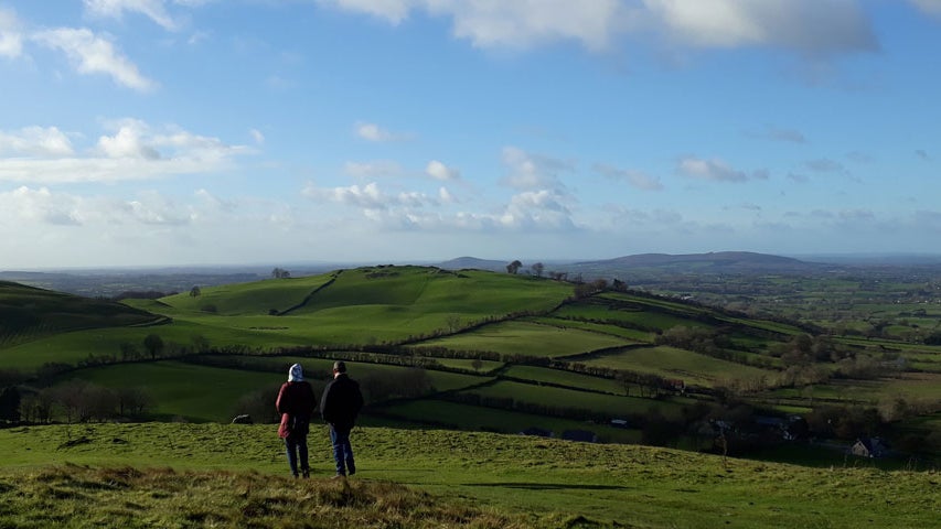 Two people enjoying the countryside views