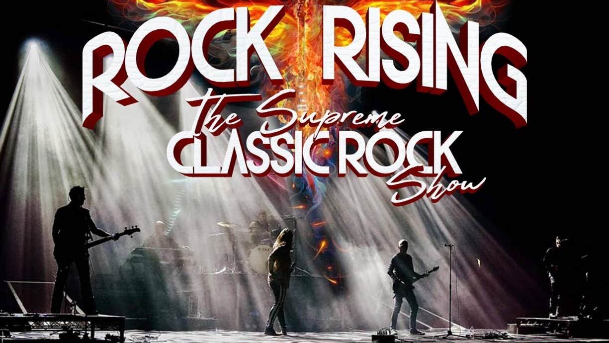 Rock Rising, The Supreme Classic Rock Show, figures playing guitars on a large stage lit by huge white spotlights.