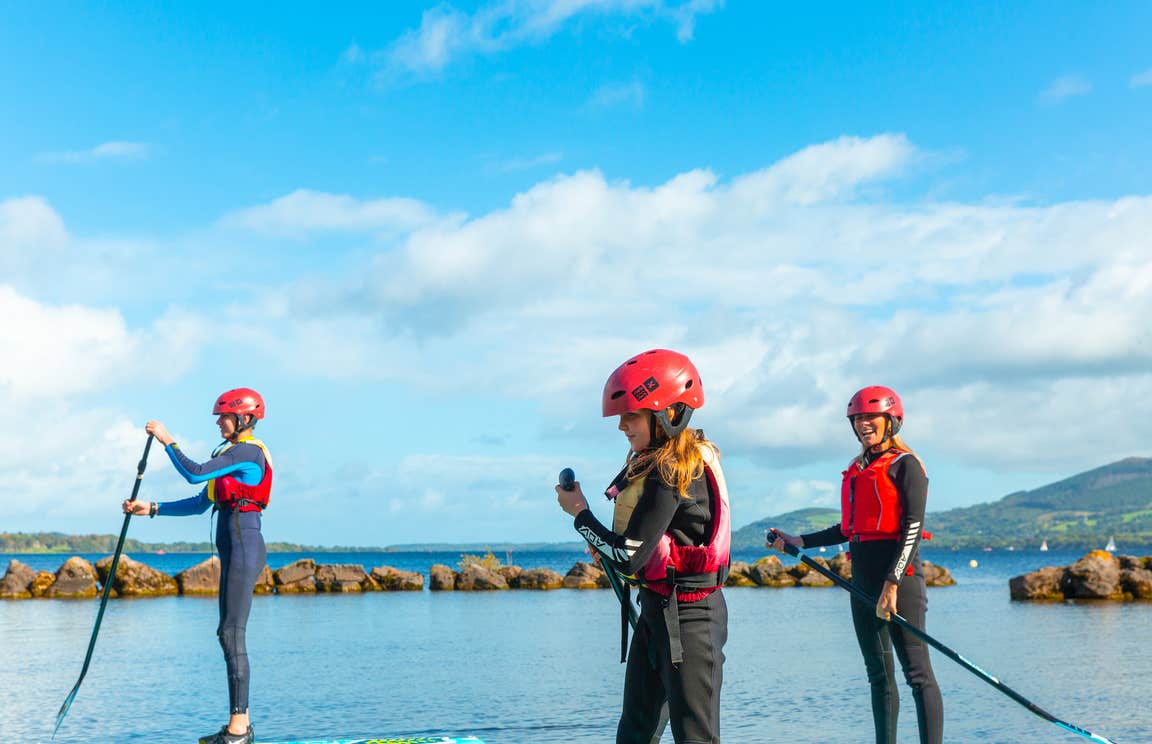 A family SUPing at UL Sports Adventure Centre in Killaloe, Co Clare