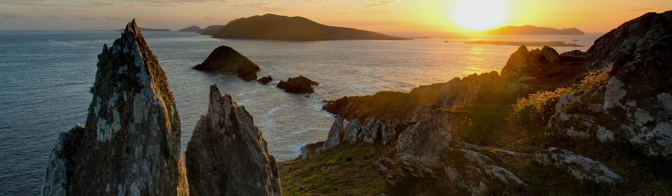 Sunset above the sea and coastline on the Dingle Peninsula, County Kerry