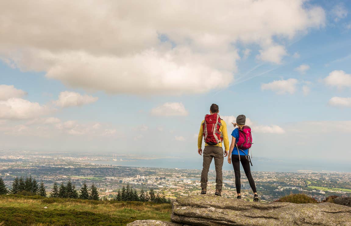 Two people hiking at Three Rock Mountain, Co. Dublin